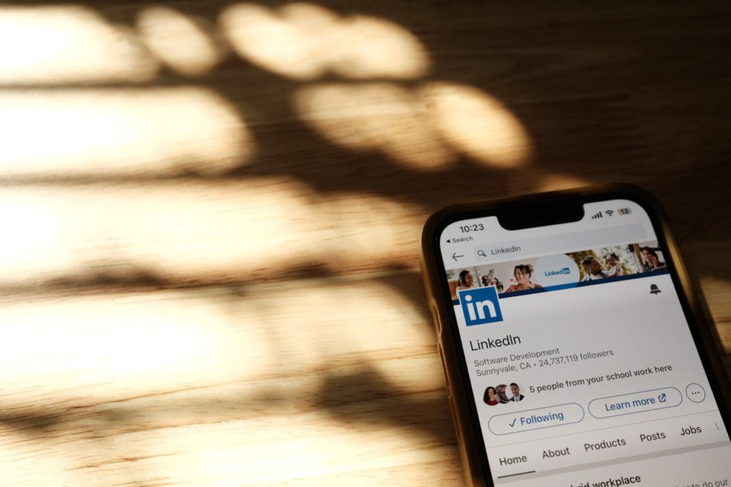 a phone with linkedin app opened